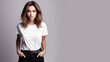 © Ema - Brunette woman wearing white t-shirt isolated on gray background