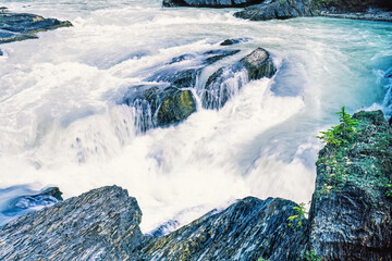 Poster - Flowing water in a rocky terrain