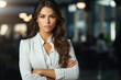 © vefimov - Woman wearing white shirt stands confidently with her arms crossed. Perfect for business, professional, or confident themes.