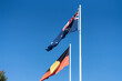 The Commonwealth of Australia Flag and the First Australians Aboriginal Flag Flying Together in the Wind