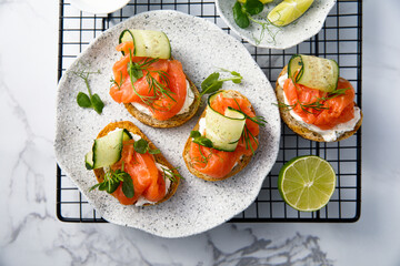 Canvas Print - Homemade crostini with smoked salmon and cucumber