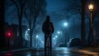 a person standing on bicycle on wet street at night