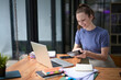 © Wasana - Businesswoman planning project with marketing calculations for plans and results