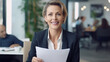 © Joshua - Smiling mature business hr woman holding cv at job interview. Happy mid aged professionall, manager, insurance agent, lawyer consulting clients sitting at work corporate office meeting woman