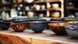Handmade craft glazed modern ceramics shop. Eco friendly sustainable tableware wabi sabi style shopping on local market. Side view