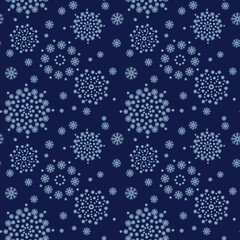 Wall Mural - Christmas winter seamless background with snowflakes. Dark blue background with snowflakes