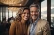 © Sportvision - Middle aged couple posing for the camera, smiling, man and a woman, successful business couple posing for the camera, rich man, rich woman, older couple