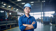 © BlazingDesigns - Attractive young asian male smiling and working engineering in industry. Work at the heavy industry manufacturing facility concept.