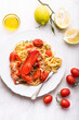 Lobster linguine pasta on the white marble table. Delicatessen, rare seafood pasta recipe. Sardinia, Sicilian, Neapolitan cuisine. Italian and French food. Top view 

