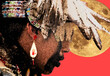 The face in profile of a native american with earing and the moon on the background.