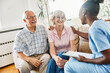 nurse doctor senior couple care caregiver help assistence retirement home nursing elderly man woman insurance black