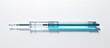 10 milliliter syringe with 18 gauge needle on white surface
