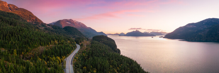 Wall Mural - Sea to Sky Highway on West Coast of Pacific Ocean. Aerial Mountain Landscape. Twilight sky.