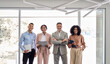 © insta_photos - Four international successful company workers and leaders business people executive team colleagues standing in office. Happy confident diverse professional employees group corporate portrait.
