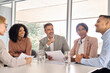 © insta_photos - Busy international professional executive team diverse colleagues employees work group consulting planning strategy, having discussion at office corporate board room meeting. Business communication.
