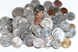 © Tamer - Pile of American coins of different times and values, 1 cents, dimes, quarters, half dollars, and dollars, vintage retro old United States of America coins, exchange rate, economy concept, USA coins