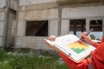 Wall Mural - action of the project engineer is rating on risk assessment form to evaluate the project investment 