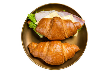 Wall Mural - French croissant sandwich with lettuce, cheese, tomatoes and ham. Dark background. Top view
