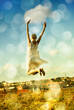 Woman, jumping and freedom with back, vacation, and outdoor for holiday, bokeh and city. Confident, energy and urban area for break, getaway and carefree with sky, barefoot and amsterdam spring time
