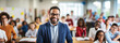 © fabioderby - Afroamerican man school teacher smile portrait in classroom with student
