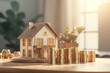 Real estate, property and financial concept, House model and stack of coins on the table for background
