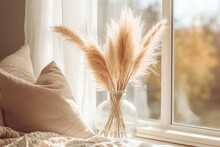 Dry Pampas Grass Flowers In A Glass Vase On A Tablet On A Coffee Table Next To A Bed, Beige Colored Pillows And Cushions, Boho Style