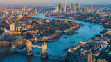 Fototapeta Londyn - Aerial panoramic cityscape view of London and the River Thames, England, United Kingdom. Tower of London. anorama include river Thames, Tower bridge and City of London and Canary Wharf buildings. 