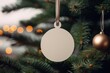 © Schizarty - Blank wooden, round Christmas ornament hanging on a ribbon for mock up