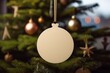 © Schizarty - Blank wooden, round Christmas ornament hanging on a ribbon for mock up