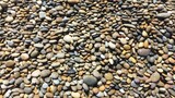 Fototapeta Desenie - close up of a lot of pebbles