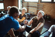 © Davor - Seniors engage in a guided workout session with a dedicated trainer