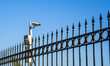fence with surveillance  camera

