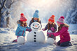 Joyful children making a snowman on a frosty sunny day