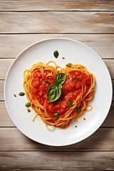 Wall Mural - Heart shaped spaghetti with tomato sauce and parmesan cheeses on white plate. AI Generated