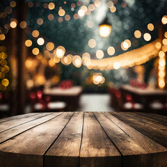 Wall Mural - Empty wooden table in front of abstract blurred festive background with light spots and bokeh for product montage display of product