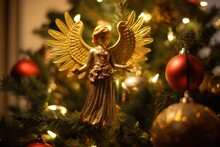 Golden angel atop a Christmas tree illuminating the room.