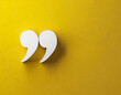 © Beste stock - Quotation mark with copy space on yellow background, White quotation mark on yellow wall 3d illustration.