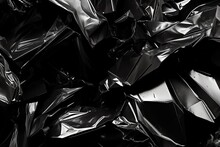 Black Crumpled Foil Abstract Background