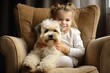 © nsit0108 - Little child with cute puppy in armchair. Kid happy face with care pet. Generate ai