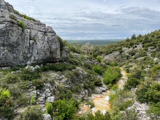 Wall Mural - The river Bijela voda or Bijeli Stream in a rugged canyon at the foot of the Przun hill, Karin Gornji - Croatia (Rijeka Bijela voda ili Bijeli potok u krševitom kanjonu podno brda Pržun - Hrvatska)