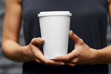 Commercial, Industry, Fashion And Style, Drinks And Beverages Concept. Woman Hands Holding White Blank With Copy Space Mug Or Cup Of Coffee Or Tea