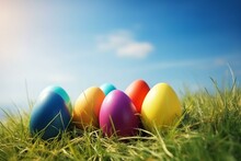 Colorful Easter Eggs On Grass With Blue Sky. Generative AI