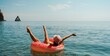 © svetograph - Summer vacation woman in hat floats on an inflatable donut mattress. Happy woman relaxing and enjoying family summer travel holidays travel on the sea.