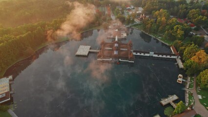 Wall Mural - Thermal Lake Heviz at sunrise in Hungary, aerial view