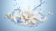 A beautiful composition of splashes of white skincare cream, water and white flowers on a light blue background