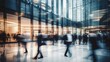 © LELISAT - Long exposure shot of crowd of business people walking in bright office lobby fast moving with blurry