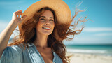 Fototapeta Boho - portrait of a woman on the beach wearing a summer hat