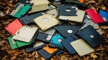 An Array Of 3.5 Inch Computer Floppy Disks Scattered On The Ground
