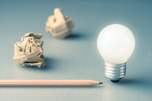 Glowing Light Bulb With Pencil And Crumpled Paper Balls, Inspiration, Start Writing, Writing Tips