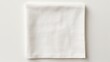 top view with white empty kitchen napkin isolated on table background. Folded cloth for mockup with copy space, Flat lay. Minimal style.